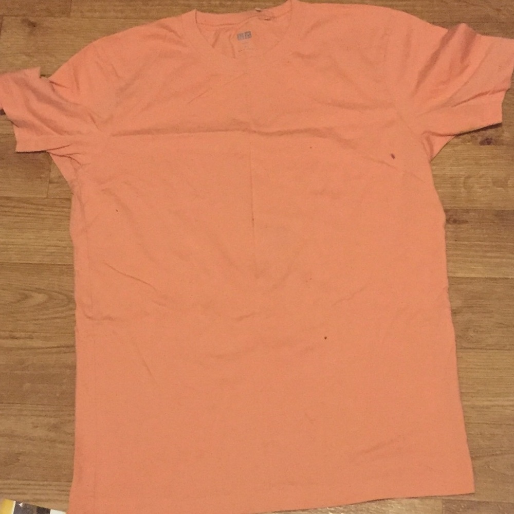 Peach colored short sleeved shirt